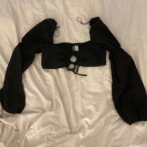 H&M cropped top. New with tags. Puff sleeve long sleeve.